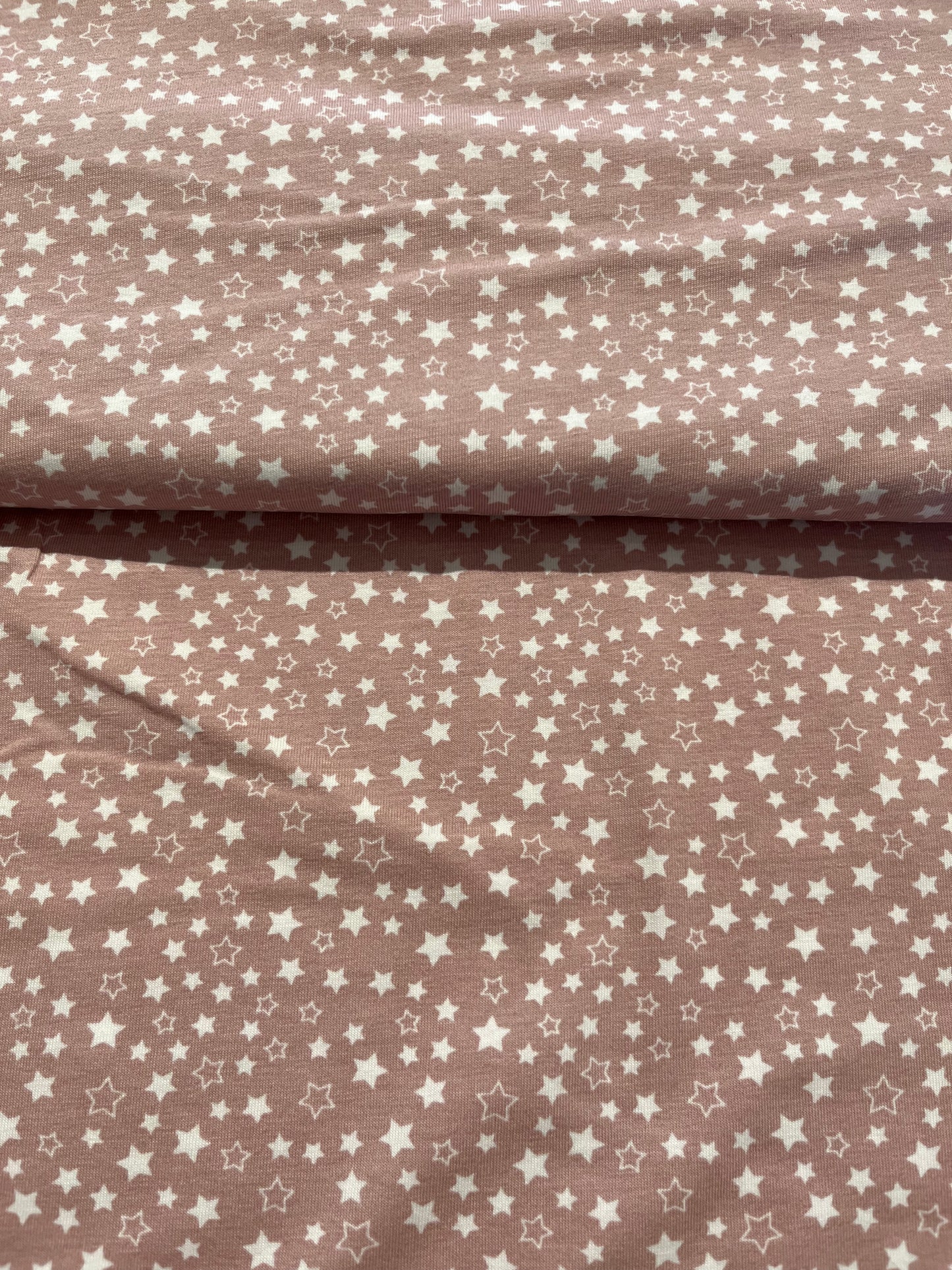 Jersey di cotone fantasia Rosa con stelline bianche